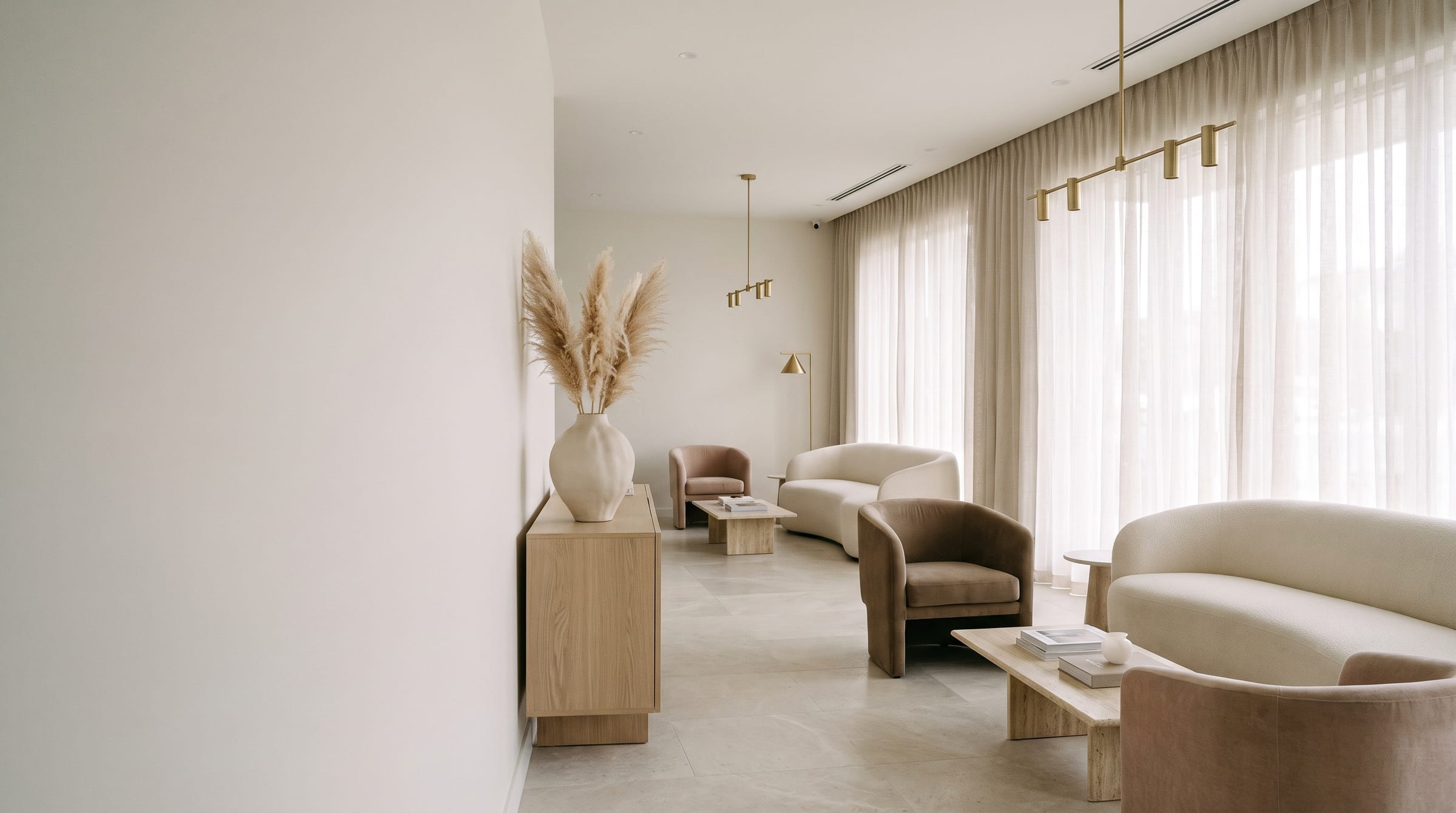 The serene, light-filled interior of {{BUSINESS_NAME}}
